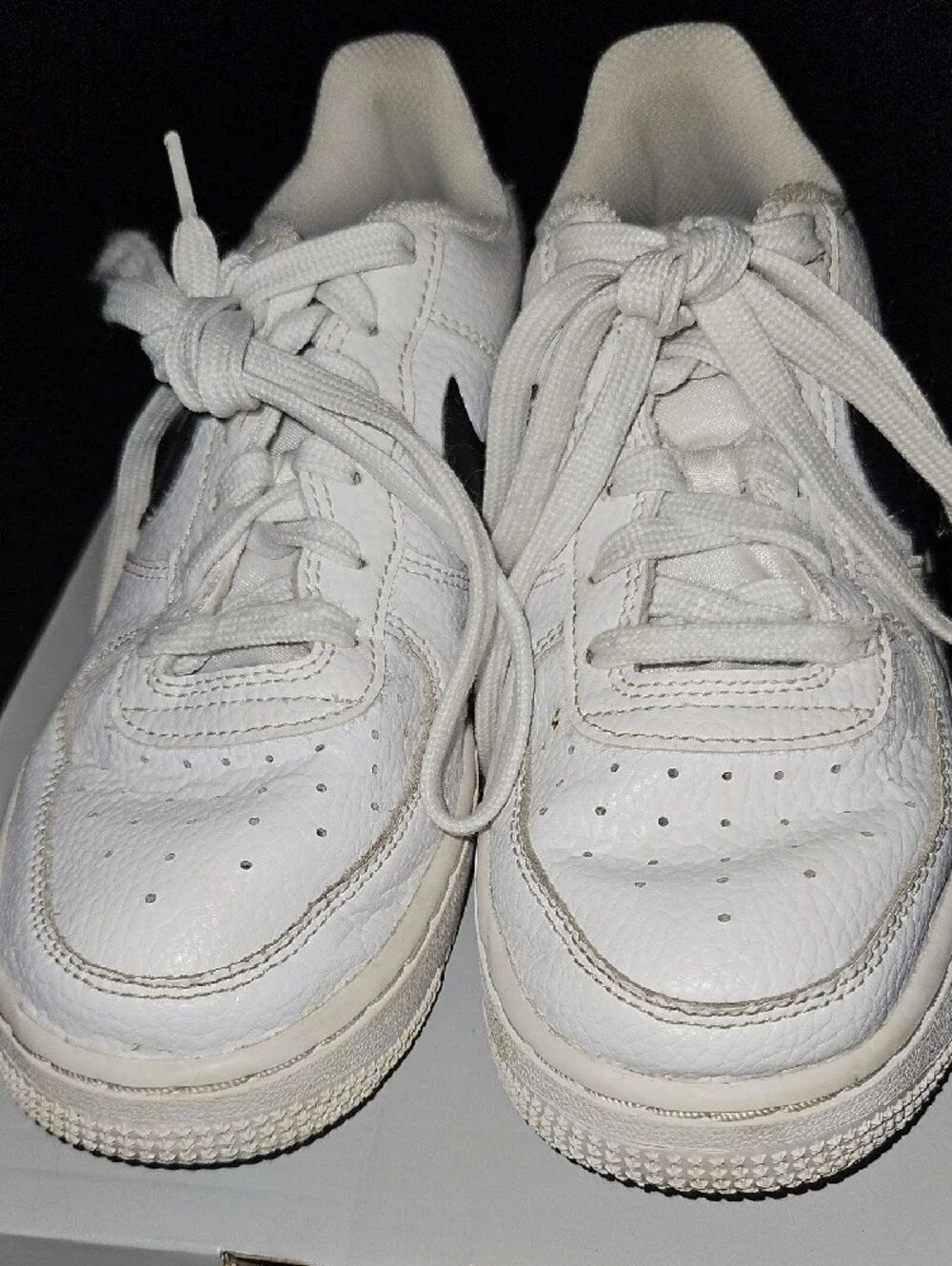 Nike White Sneakers with Black Swoosh